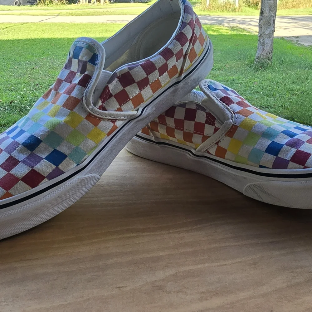 Vibrant Kid’s Vans Rainbow Checkerboard Slip-Ons – Playful + Iconic